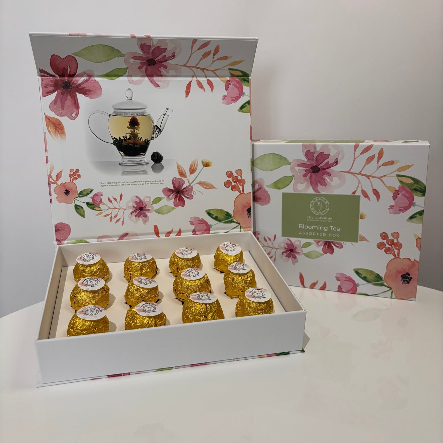 Blooming Tea Gift Box with gold wrapped tea balls.