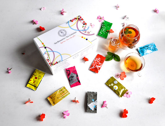 Single serve pyramid enveloped tea gift box